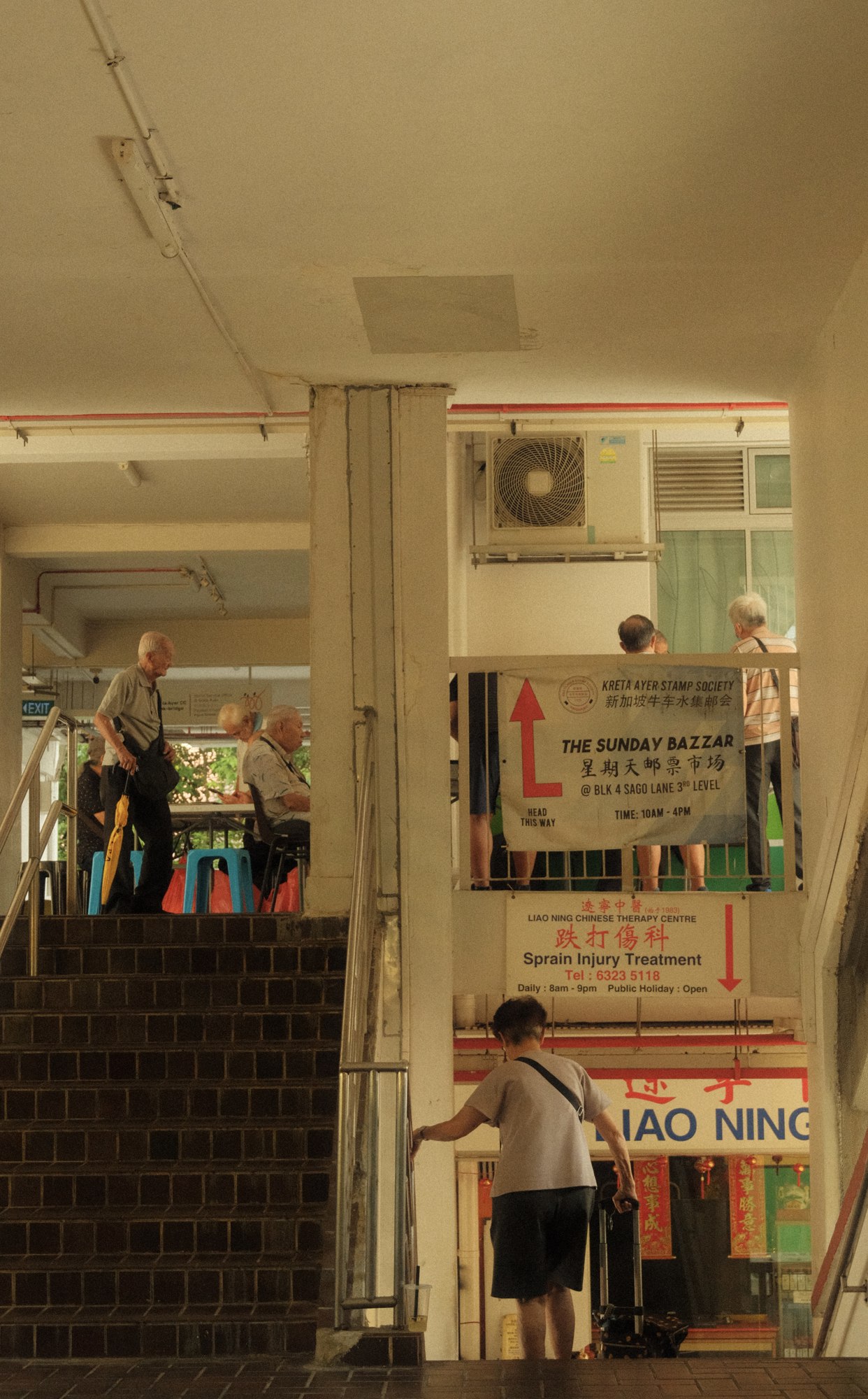 People inside a softly lit shop
